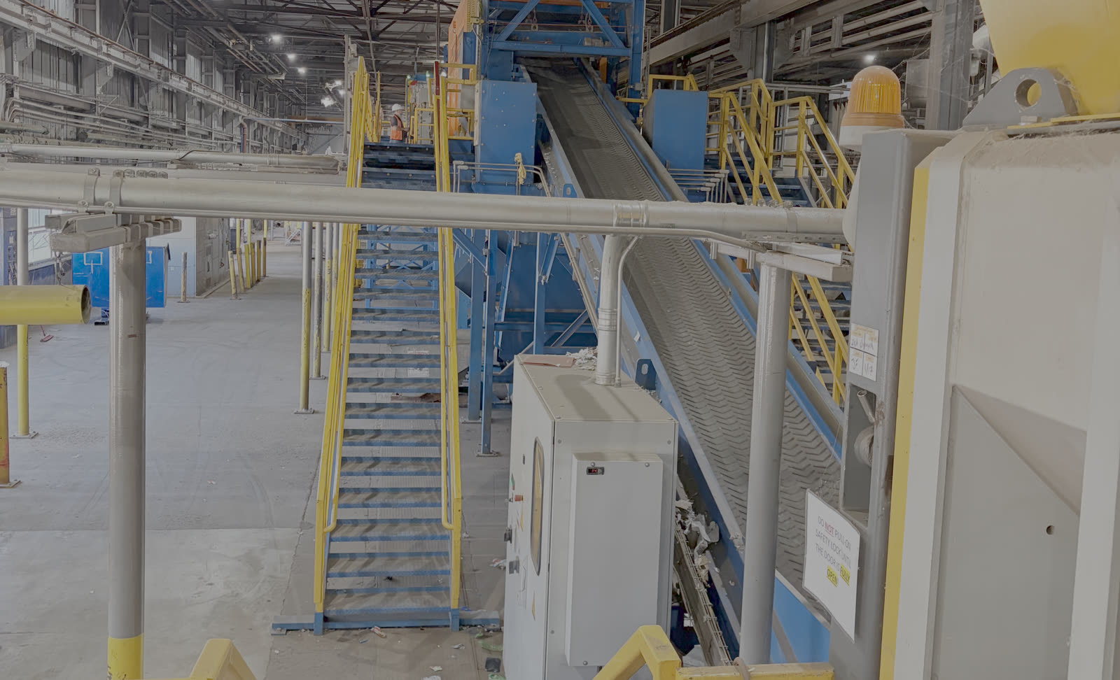 Sort line running inside a materials recovery facility